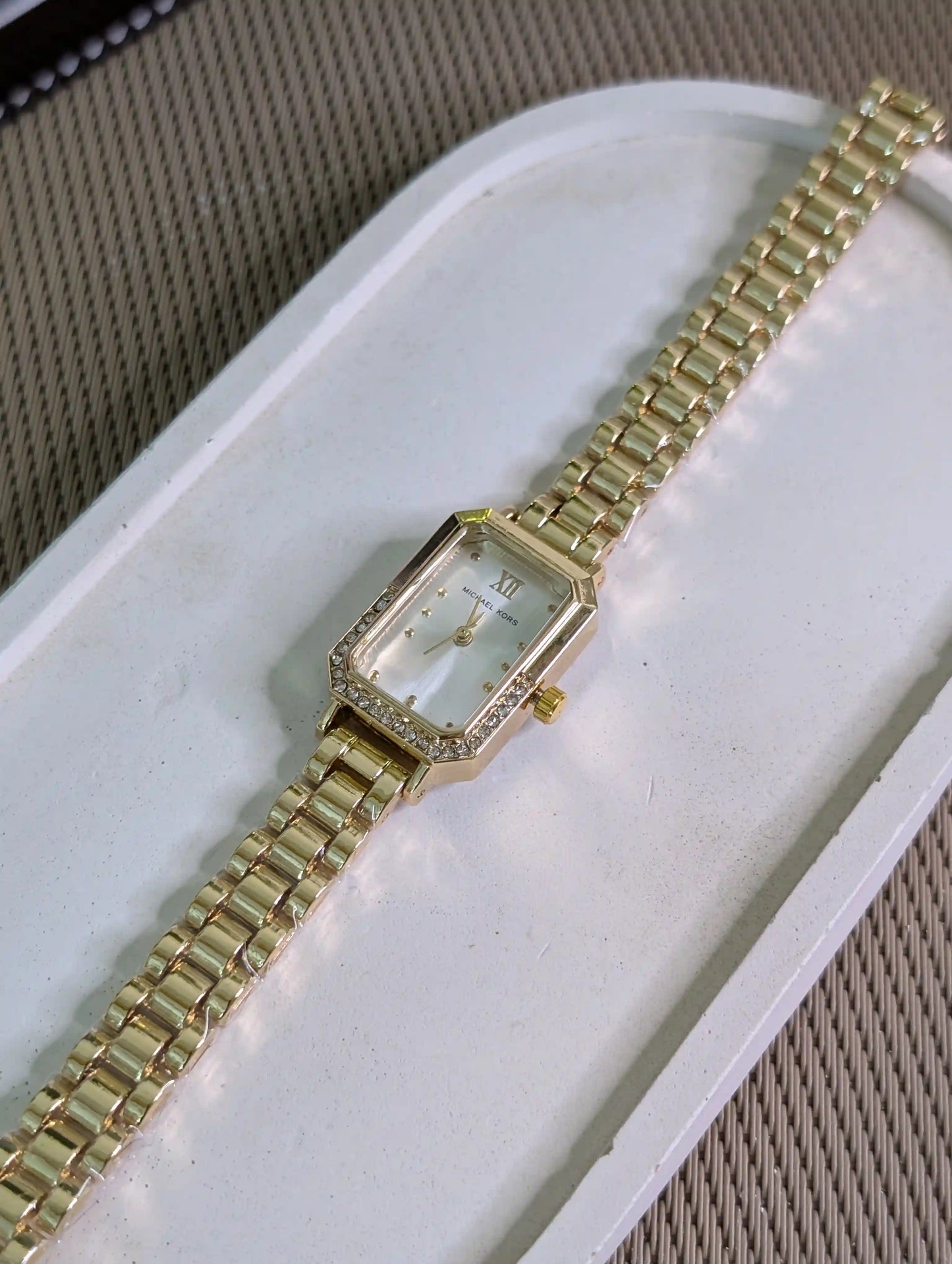 MK gold watch