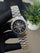 Silver with charcoal dial