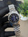Silver with blue dial
